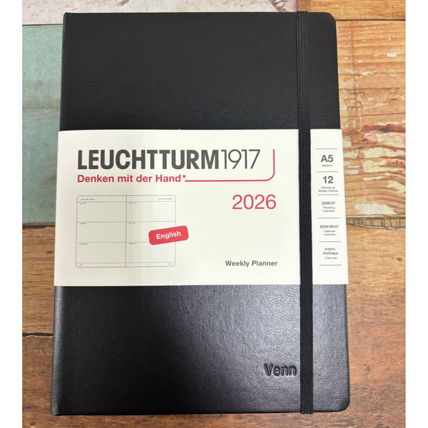 이미지를 갤러리 뷰어에 로드 , Personalized Name Embossing on Leuchtturm1917 A5 Medium Hardcover Weekly Planner 2026 - Black