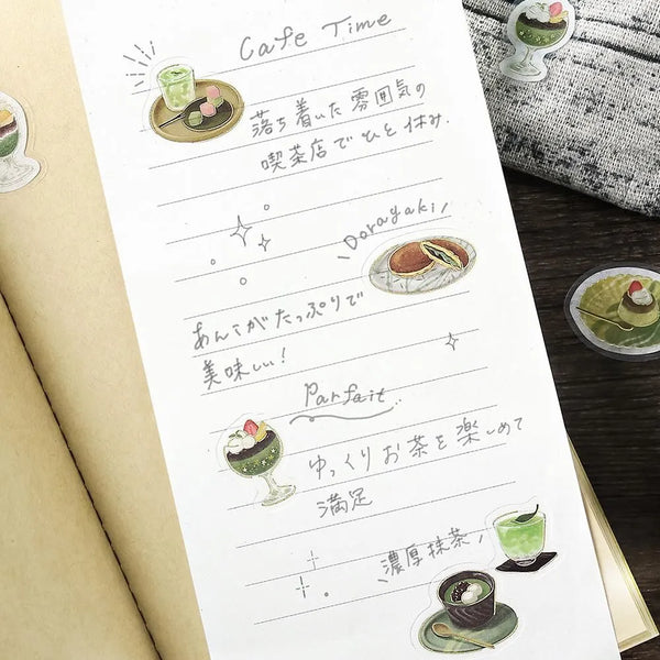 将图片加载到图库查看器,Green matcha-themed café flake sticker sheet with illustrated desserts, tea bowls and small plates accented with foil.