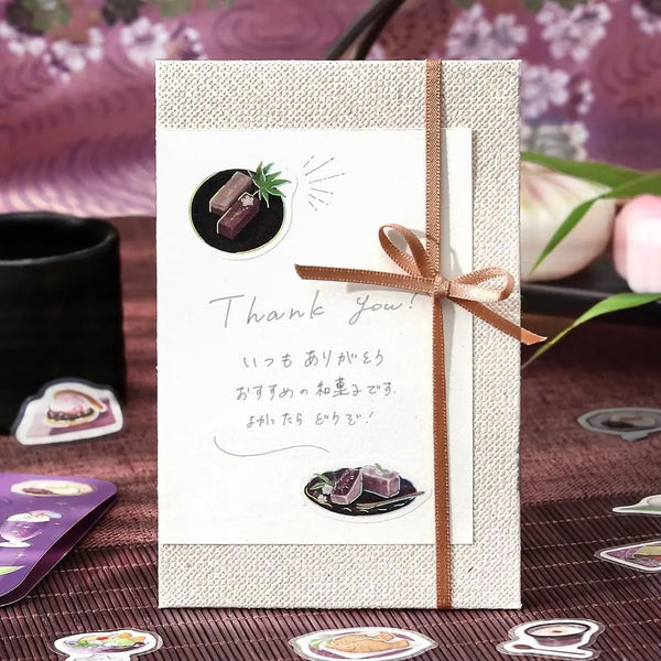 将图片加载到图库查看器,Purple café-themed flake sticker sheet featuring traditional sweets, tea cups and parfaits with metallic foil details.