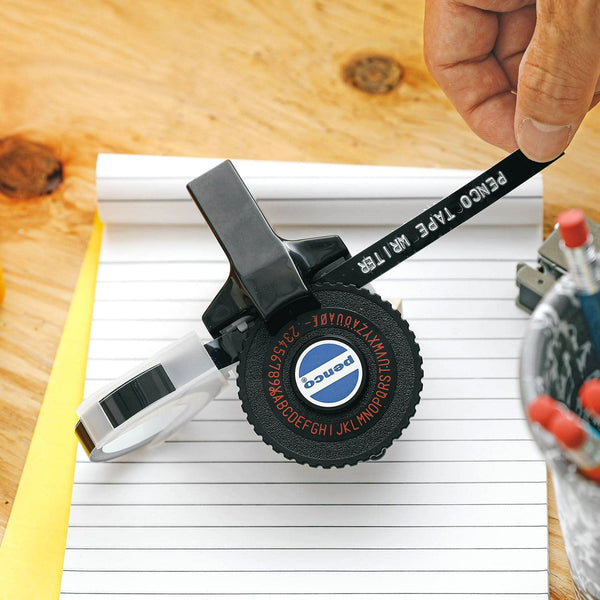 Load image into Gallery viewer, Penco Tape Writer – Black vintage label maker by Hightide, with black body and embossed label tape.