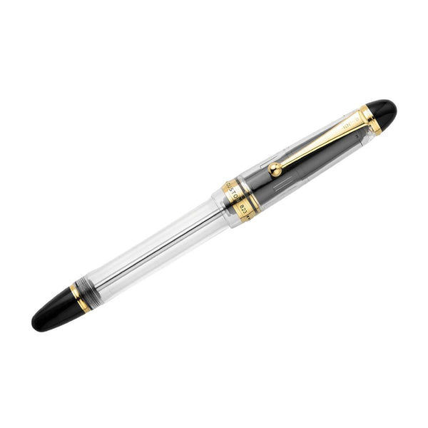 Load image into Gallery viewer, Pilot Custom 823 Fountain Pen in fully transparent clear resin with gold trim and 14K gold nib, featuring a high-capacity vacuum-filling system – perfect for showcasing ink flow and craftsmanship.