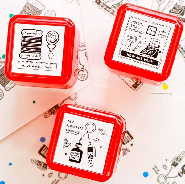 Load image into Gallery viewer, Eric Small Things Pre-Inked Stamp by Sanby Japan, compact black-ink stamp for journaling and planner decoration.