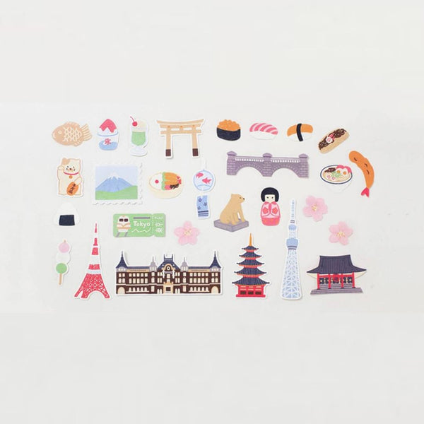 Load image into Gallery viewer, Suatelier Sticker – Tokyo Travel Diary featuring 28 illustrated Tokyo motifs such as landmarks, street food, and city scenes on a 15×17 cm coated paper sheet.