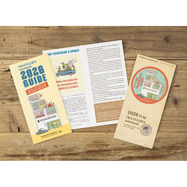 将图片加载到图库查看器，TRAVELER&#39;S notebook Refill 2026 featuring a weekly schedule with memo space, grid pages, monthly calendar and a bonus Diary guide with sticker.
