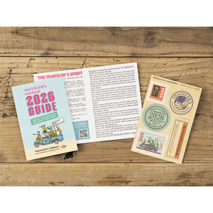 TRAVELER'S notebook Passport Size Refill 2026 Monthly featuring monthly schedule from December 2025 to January 2027, calendar, year schedule, blank and travel guide.