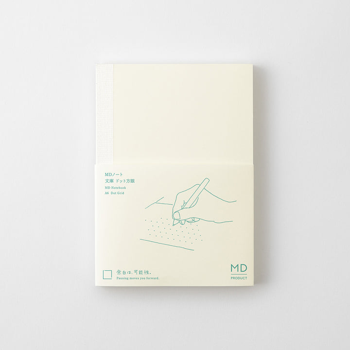 MD Notebook <A6> Dot Grid — flat lay