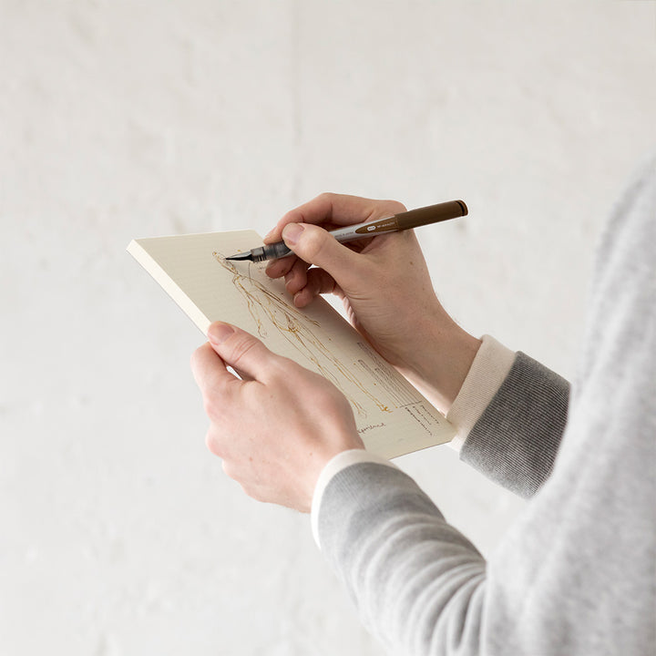 MD Notebook Paper Pad A5 - Grid — angle view