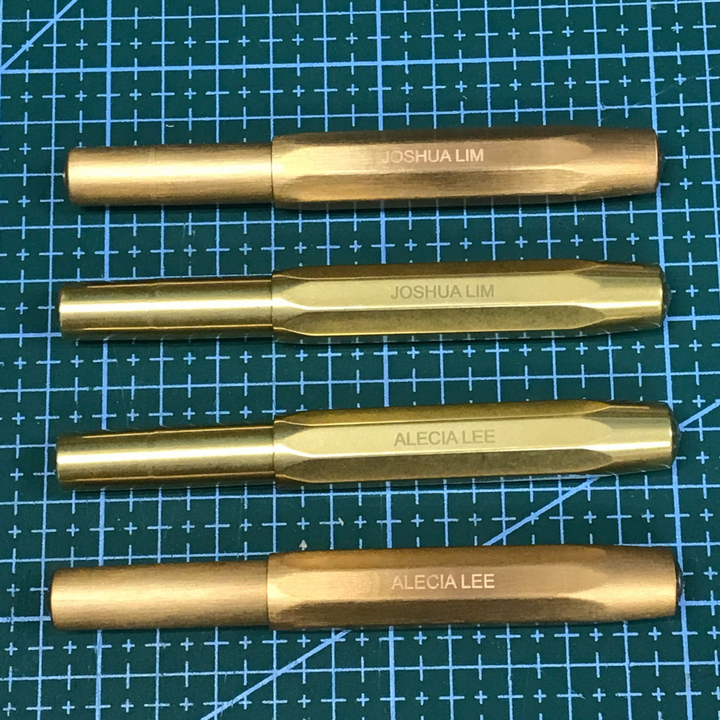Kaweco Brass Sport Gel Rollerball Pen — flat lay