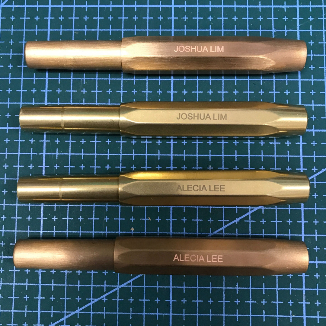 Kaweco Brass Sport Gel Rollerball Pen — flat lay
