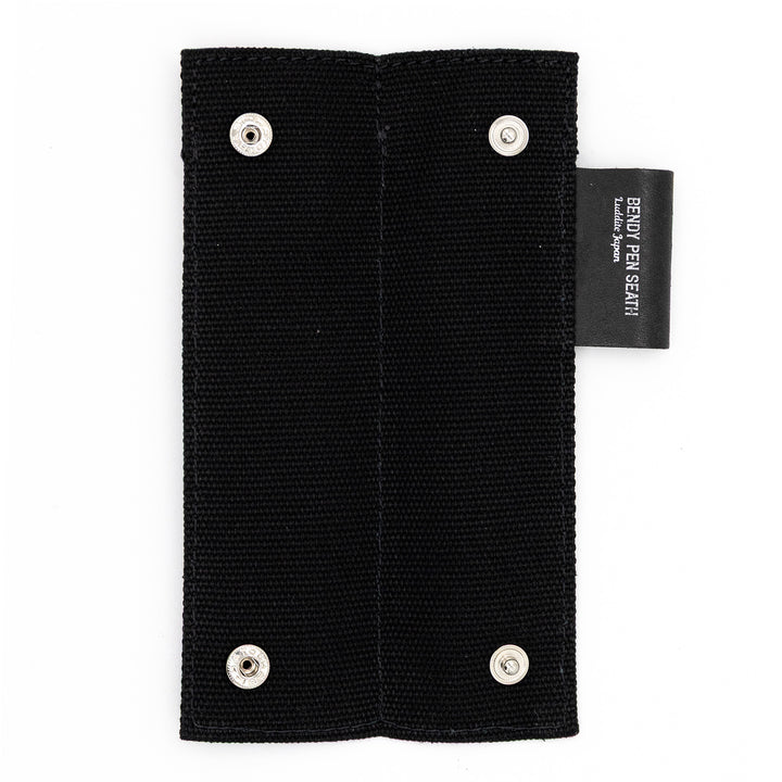 Luddite Canvas×MAYA Bendy Pen Sheath 2+1 - Black — writing at an angle