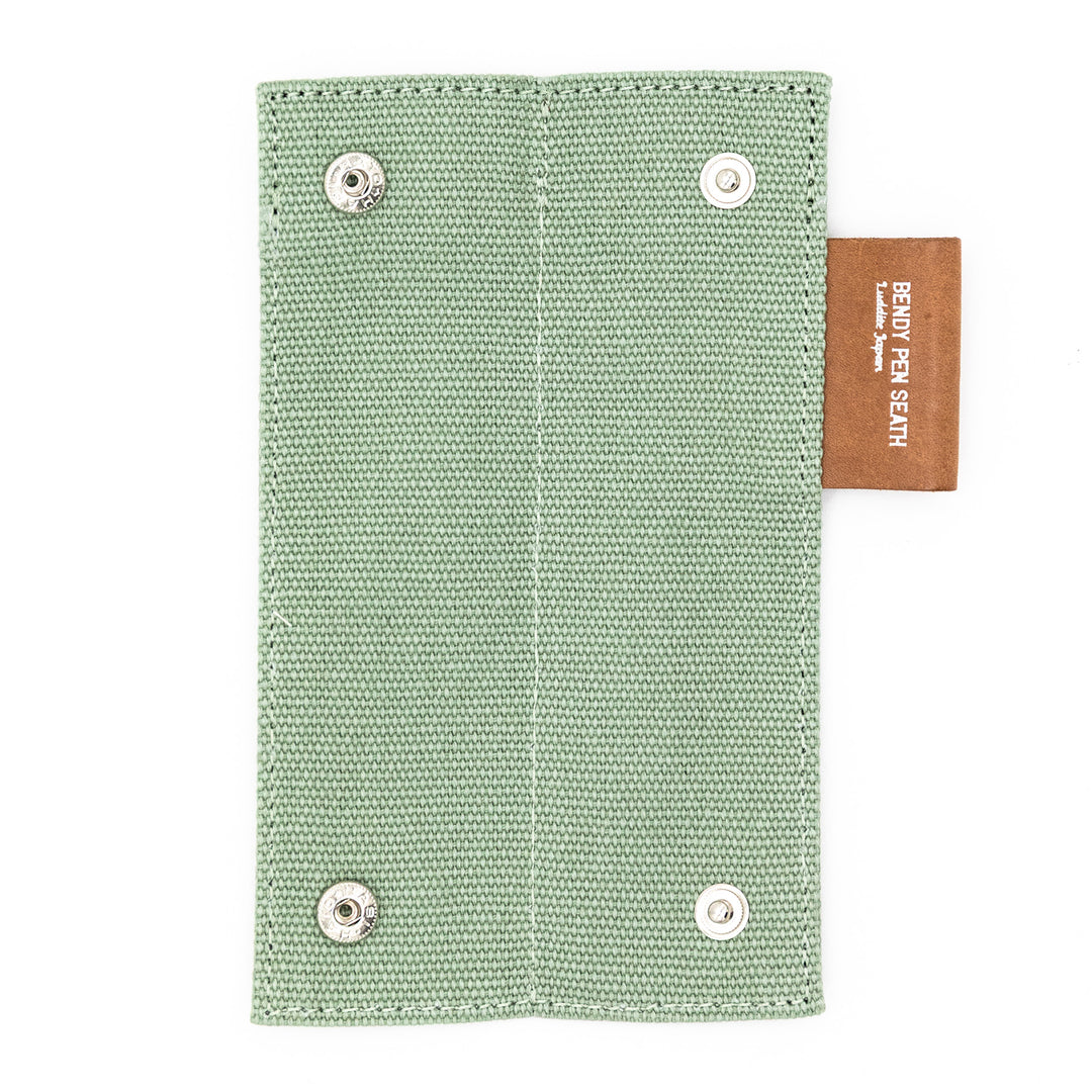 Luddite Canvas×MAYA Bendy Pen Sheath 2+1 - Khaki — writing at an angle