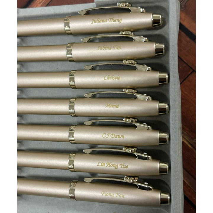Personalized Name Engraving On Sheaffer 100 Emily in Paris 9377 Champagne Gold Rollerball Pen with Champagne Gold Trims and Bow-Shaped Clip Emblem