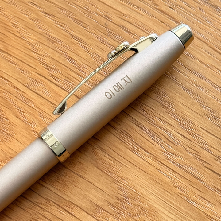 Personalized Name Engraving On Sheaffer 100 Emily in Paris 9377 Champagne Gold Rollerball Pen with Champagne Gold Trims and Bow-Shaped Clip Emblem