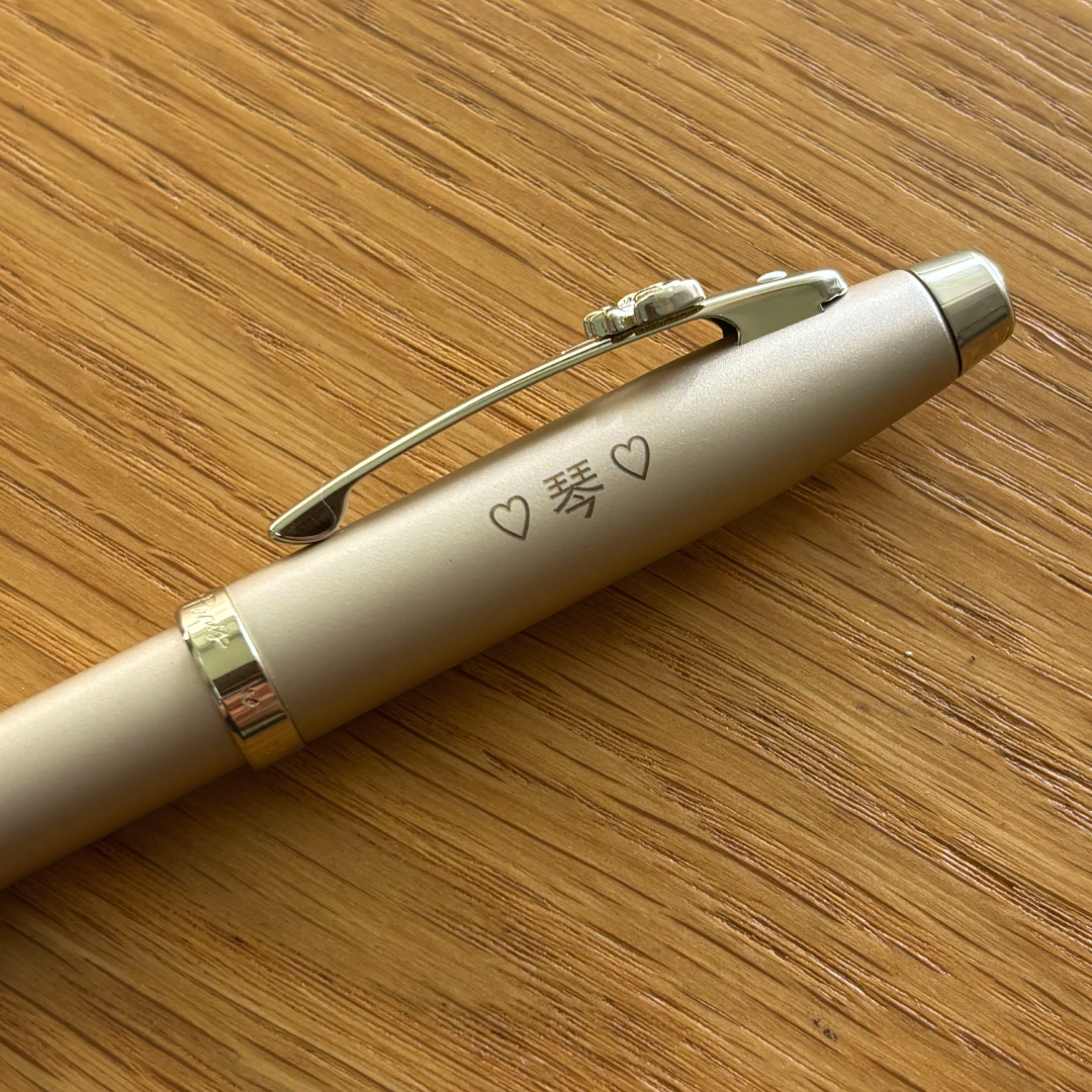 Sheaffer 100 Emily in Paris 9377 Champagne Gold Rollerball Pen with Champagne Gold Trims and Bow-Shaped Clip Emblem