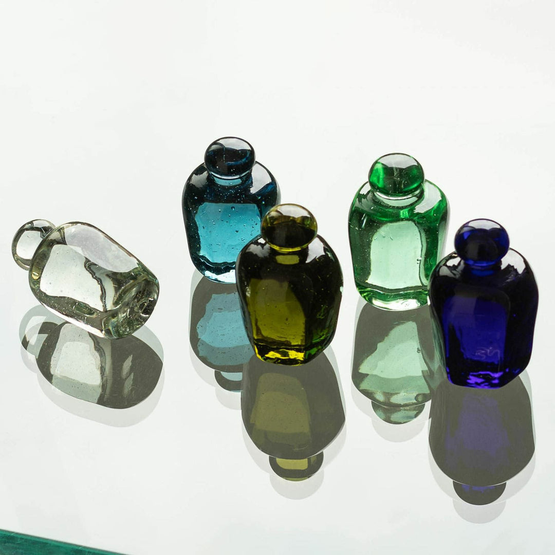 Attaché Recycled Glass Paperweight made from recycled bottles.