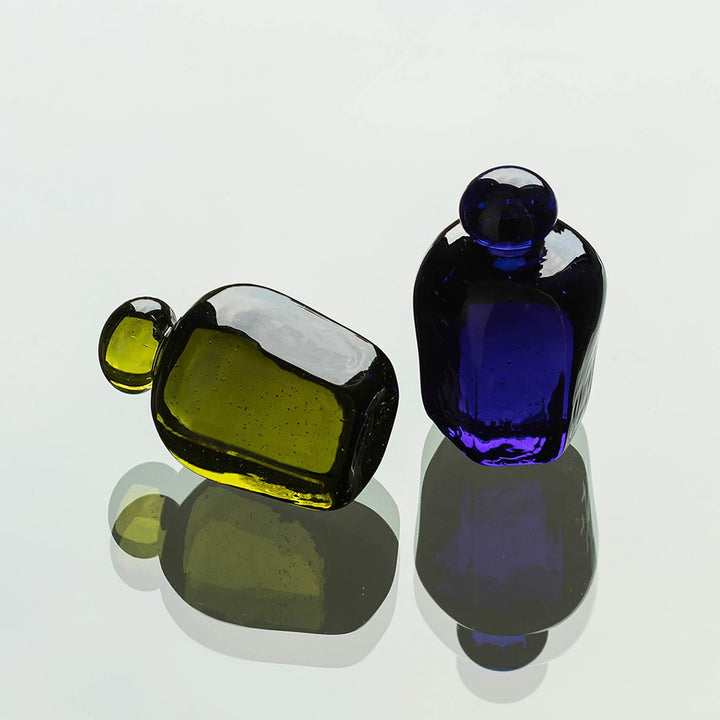 Discover the Attaché Recycled Glass Paperweight made from repurposed sake bottles in rich natural hues. A sustainable, handcrafted piece of Japanese glass art.