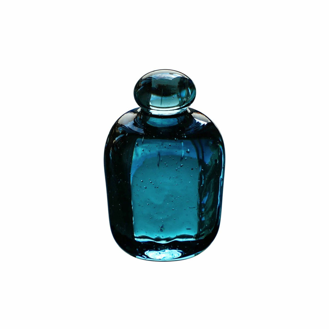 Attaché Recycled Glass Paperweight made from recycled soda bottle glass with a soft pale blue tint.