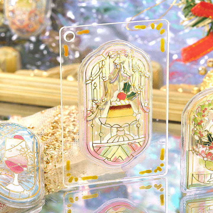 BGM Cafe a la Mode stained-glass sticker of a custard pudding with holly, on a clear acrylic card