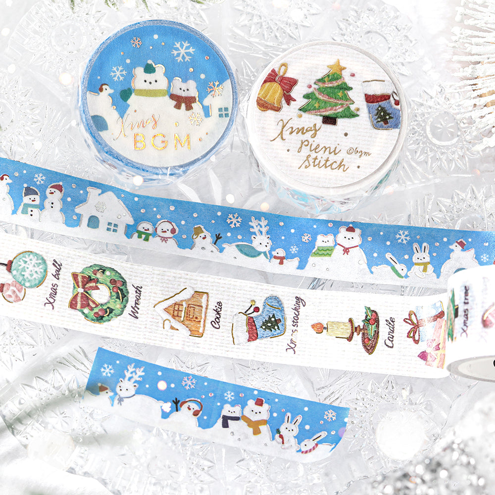 BGM Various Snowmen and Pieni Stitch Christmas washi tapes unrolled on frosted glass