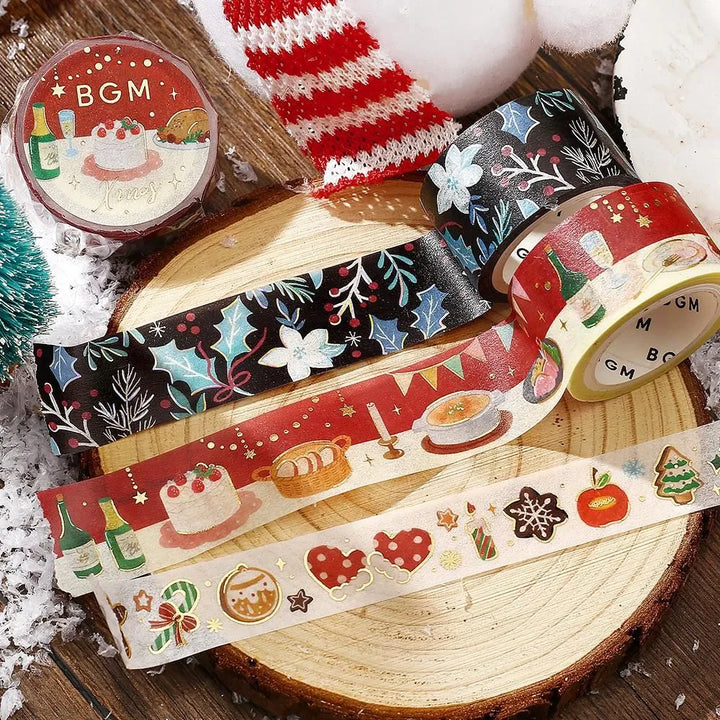 BGM Christmas washi tape featuring holly, berries, and winter flowers with gold foil details.