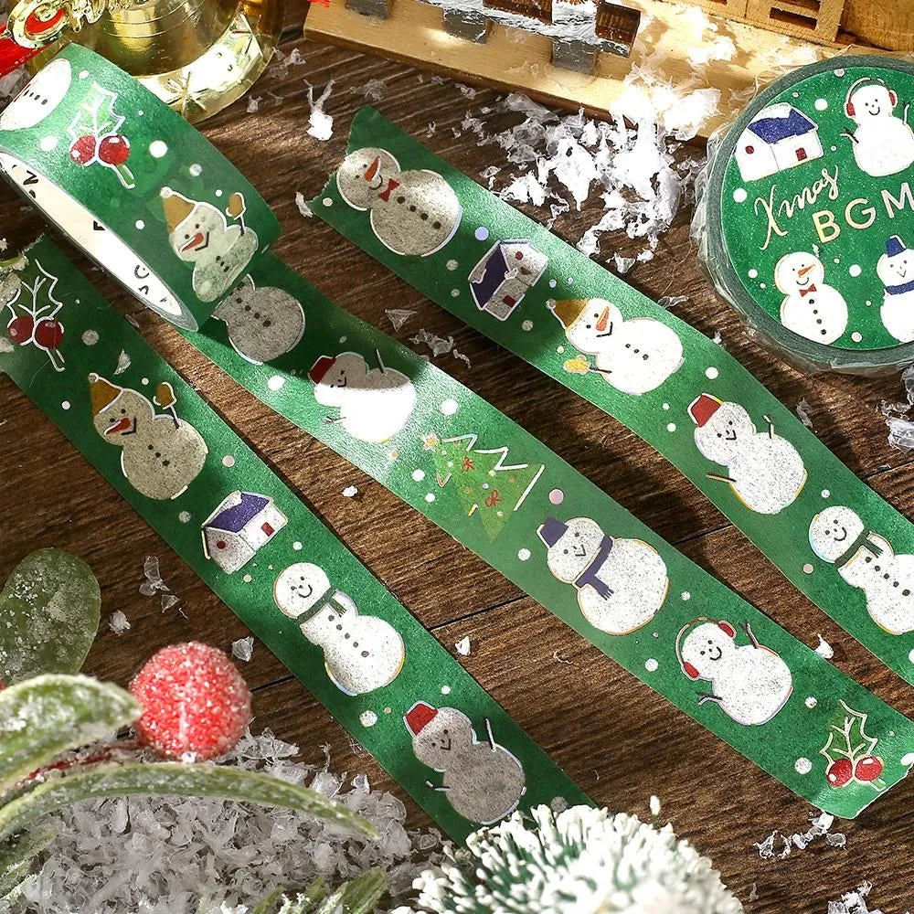 BGM Christmas washi tape featuring cute snowmen in scarves with gold foil accents.