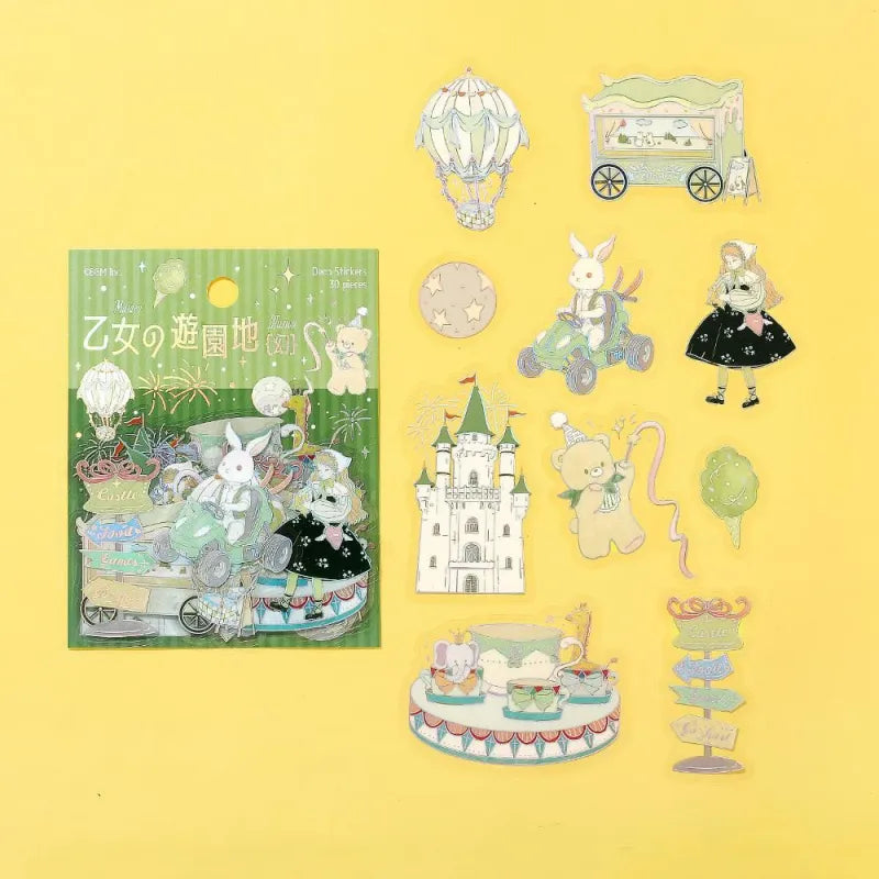 BGM Foil Stamping Clear Seal – Maiden’s Amusement Park: Illusion with 30 PET sheets of pastel green-themed designs including castles, air balloons, and whimsical girl, finished with shimmering foil details.