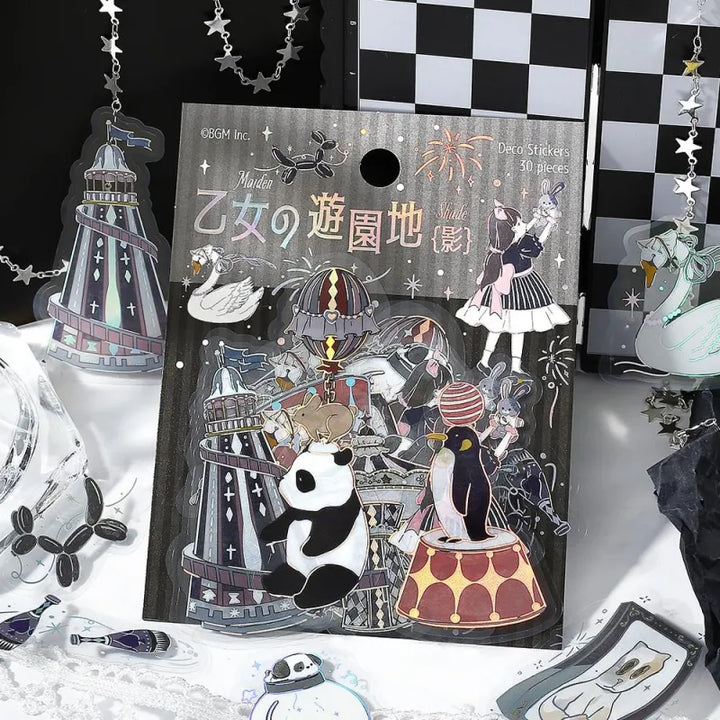 BGM Foil Stamping Clear Seal – Maiden’s Amusement Park: Shadow with 30 PET sheets of black-themed designs featuring panda, swan, penguin, and airplane carousel in a whimsical circus style with foil detailing.