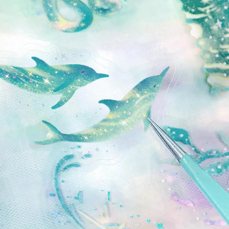 BGM Foil Stamping Clear Seal – Stardust Magic: Earth edition with 30 PET sheets featuring 10 foil-accented stickers per sheet. Designs include skies, clouds, greenery, and planetary motifs in an Earth-inspired color palette.