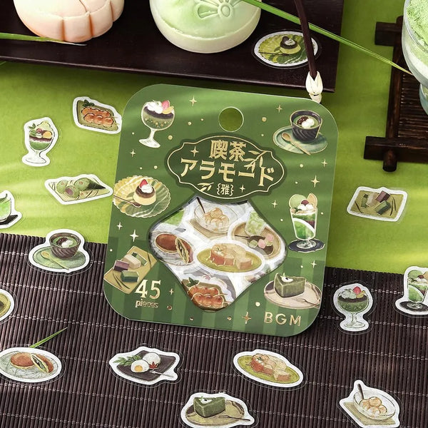 将图片加载到图库查看器，Green matcha-themed café flake sticker sheet with illustrated desserts, tea bowls and small plates accented with foil.
