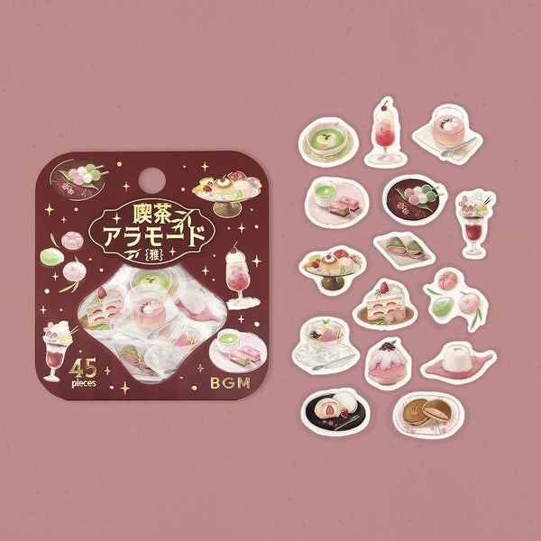 将图片加载到图库查看器，Pink-toned café flake stickers showing cakes, parfaits and delicate desserts with warm foil accents on washi paper.
