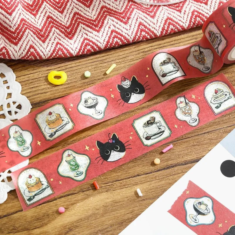 BGM Foil Stamping Masking Tape – Black Cat Café: Café Frame design with cozy illustrations of café scenes, a black cat, and gold foil accents on a 20mm washi tape roll.