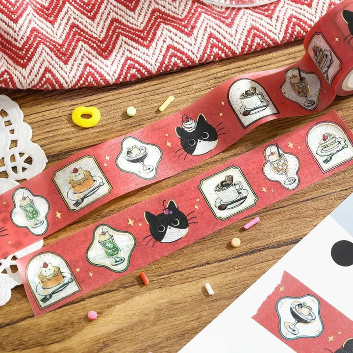 BGM Foil Stamping Masking Tape – Black Cat Café: Café Frame design with cozy illustrations of café scenes, a black cat, and gold foil accents on a 20mm washi tape roll.