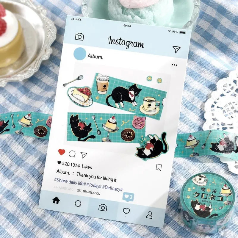 BGM Foil Stamping Masking Tape – Black Cat Café: Café Stroll featuring black cats with desserts, coffee, and foil paw prints on a 20mm washi tape roll.