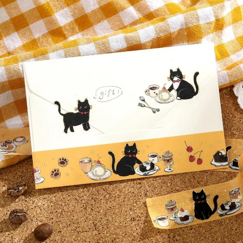 BGM Foil Stamping Masking Tape – Black Cat Café: Sweets Time design with black cats, café desserts, and pastel frames on yellow washi tape with foil accents.