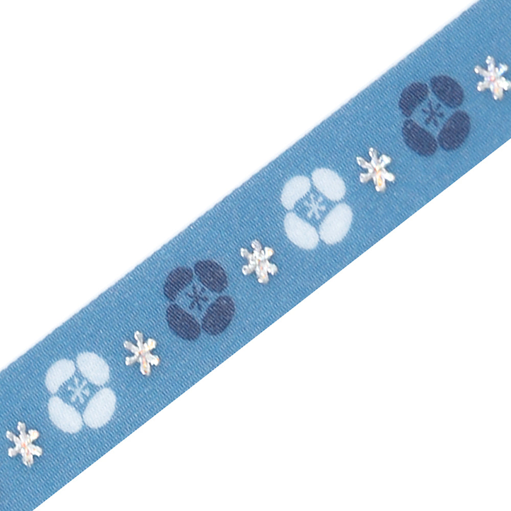 A roll of washi tape featuring delicate night-blooming flowers accented with shimmering metallic foil, adding a moonlit elegance to journals, planners, and craft projects.