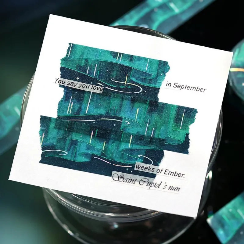 BGM Foil Stamping Masking Tape – Sky Encyclopedia: Aurora design with green and teal gradients, shimmering foil light trails, and starry details on a 20mm washi tape roll.