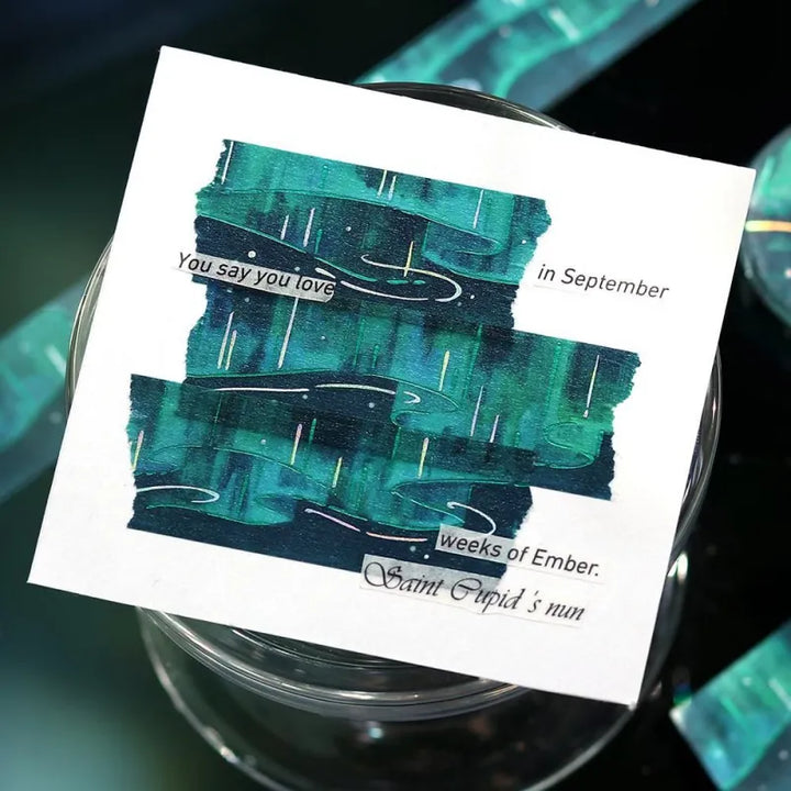 BGM Foil Stamping Masking Tape – Sky Encyclopedia: Aurora design with green and teal gradients, shimmering foil light trails, and starry details on a 20mm washi tape roll.
