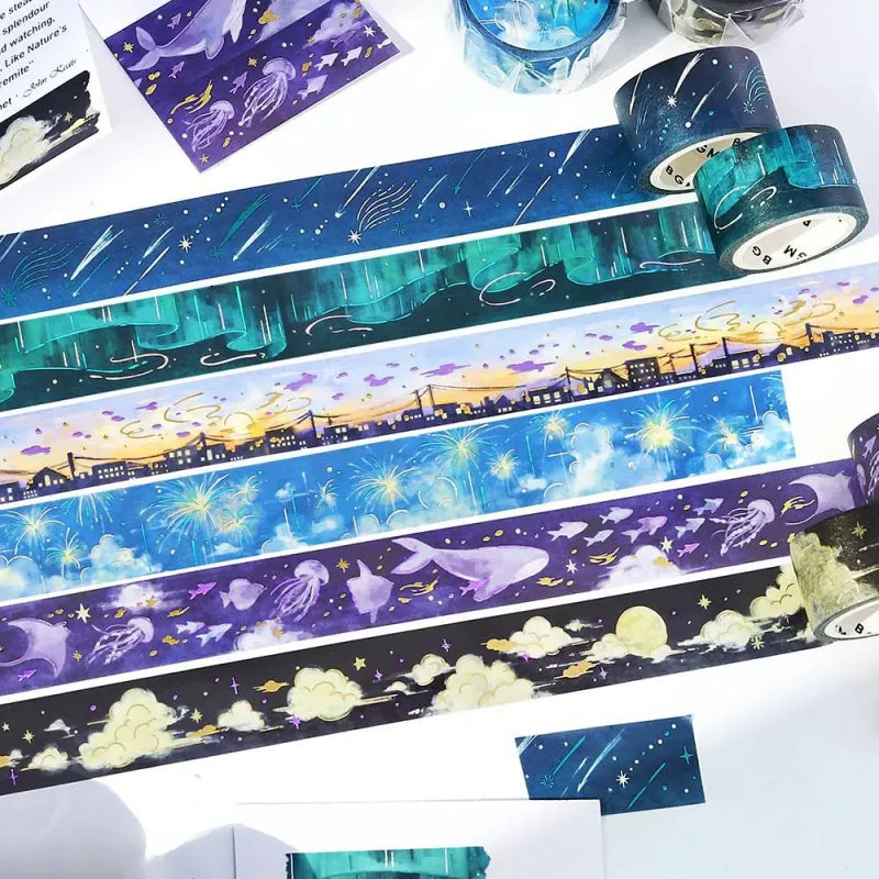 BGM Foil Stamping Masking Tape – Sky Encyclopedia series featuring watercolor sky scenes with gold foil celestial designs on 20mm washi tape rolls. A dreamy collection inspired by the beauty of the sky from dawn to dusk.