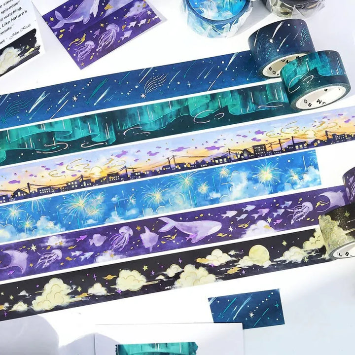 BGM Foil Stamping Masking Tape – Sky Encyclopedia series featuring watercolor sky scenes with gold foil celestial designs on 20mm washi tape rolls. A dreamy collection inspired by the beauty of the sky from dawn to dusk.