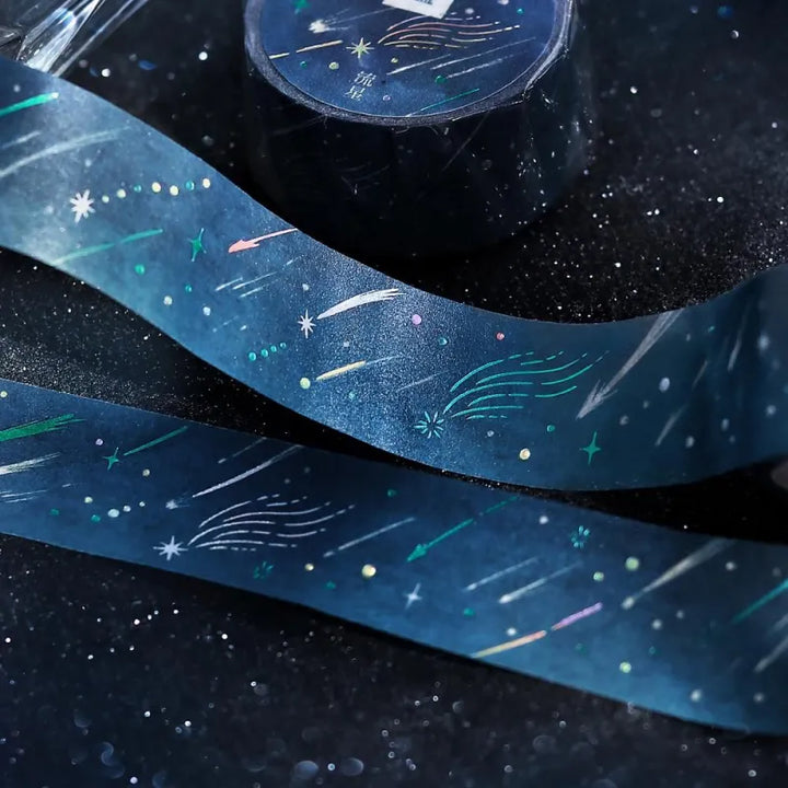 BGM Foil Stamping Masking Tape – Sky Encyclopedia: Meteor design with deep night sky hues, shooting stars, and celestial accents on a 20mm washi tape roll.