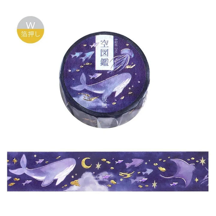BGM Foil Stamping Masking Tape – Sky Encyclopedia: Night Calm design with whales and jellyfish in a purple starry sky, accented with gold foil moons and celestial motifs on a 20mm washi tape roll.