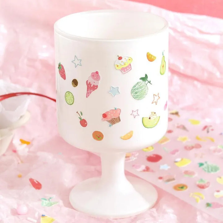 BGM Seat Seal – Colorful Fruits featuring a single PET sticker sheet with cute, round fruit designs including strawberries, oranges, cherries, and lemons in vibrant colors.
