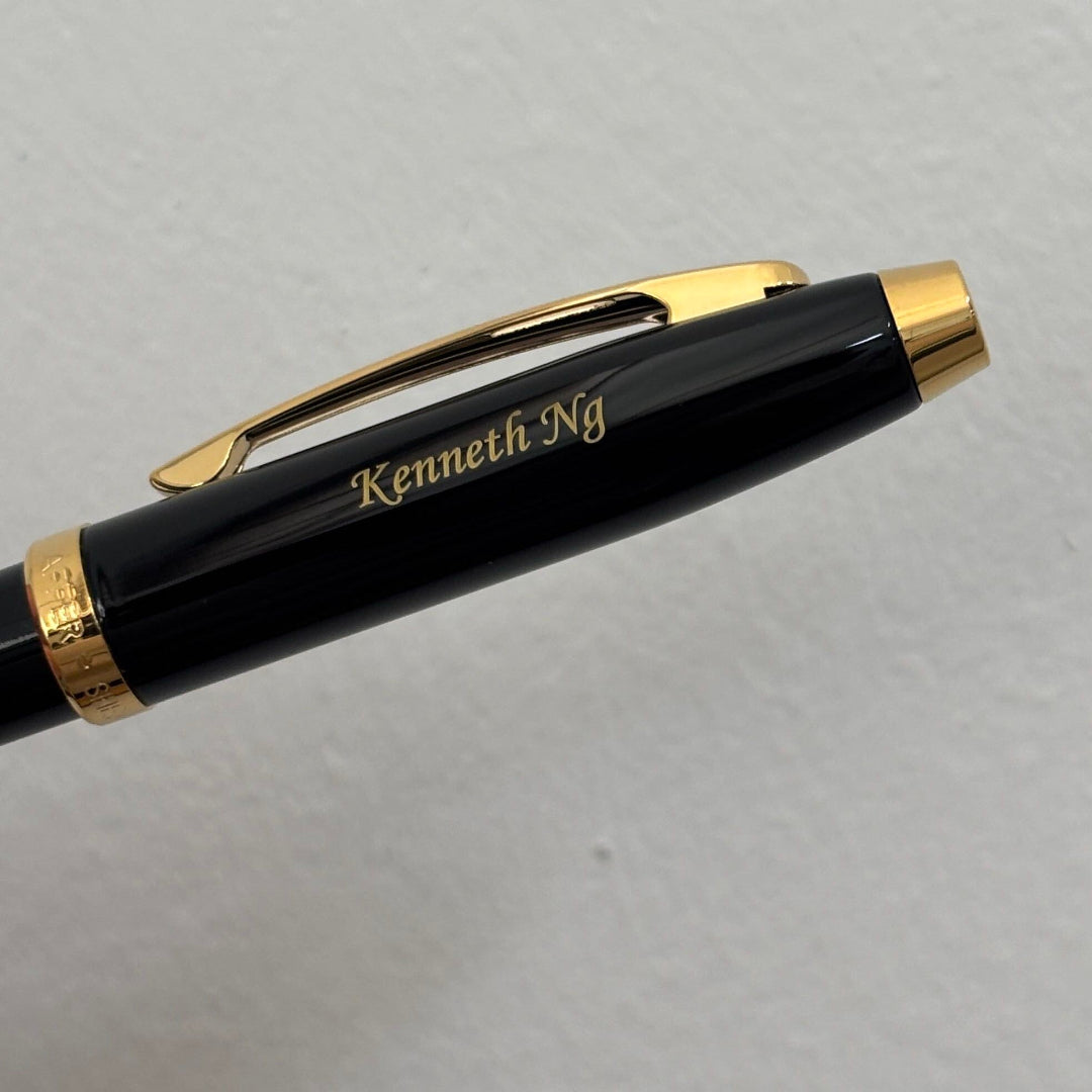 Custom Pen Engraving – Personalised Name Engraving on Sheaffer 100 E9322 Glossy Black With Gold Trims Ballpoint Pen at Cityluxe WorkRoom