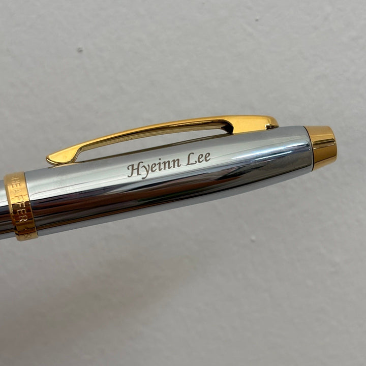 Custom Pen Engraving – Personalised Name Engraving on Sheaffer 100 E9340 Bright Chrome With Gold Trims Ballpoint Pen at Cityluxe WorkRoom