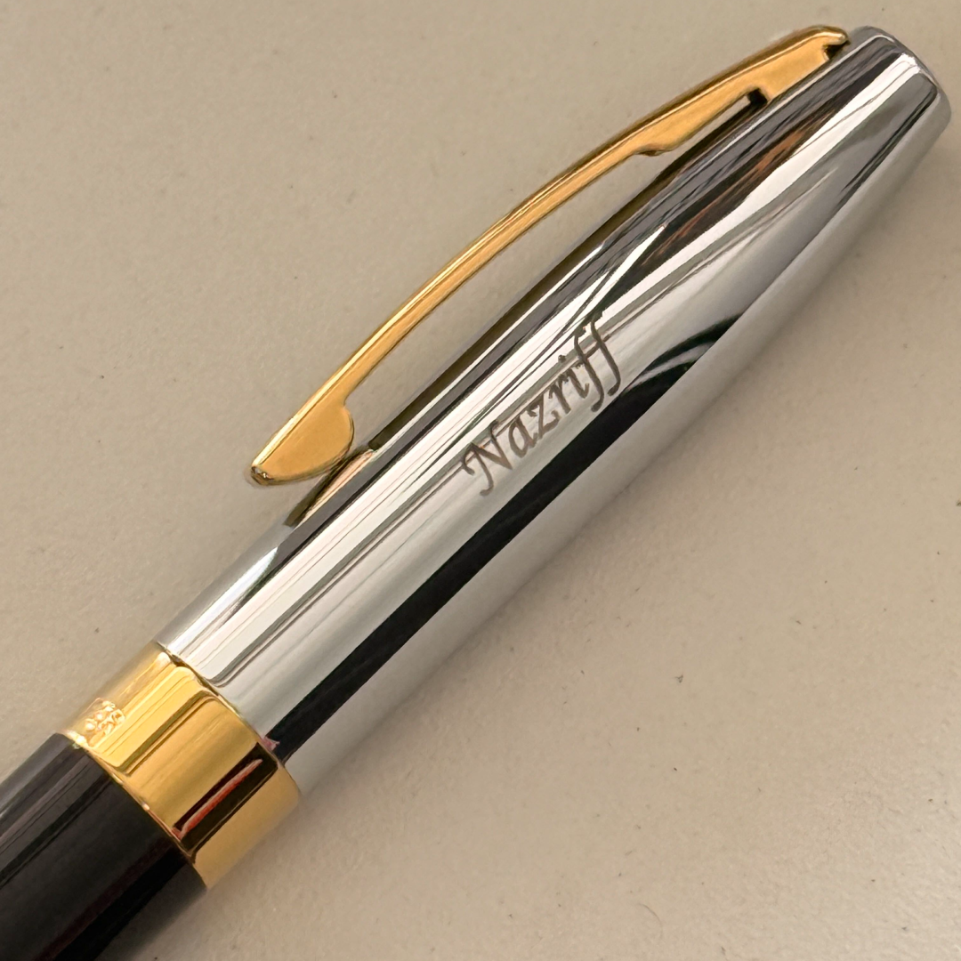Custom Pen Engraving – Personalised Name Engraving on Sheaffer Legacy 9065 Bi-color Black Barrel and Chrome Cap Ballpoint Pen with 14K IP Gold-Plated Trims at Cityluxe WorkRoom