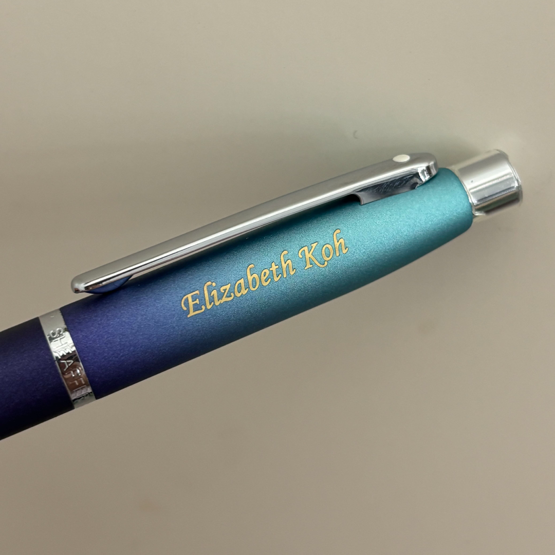 Custom Pen Engraving – Personalised Name Engraving on Sheaffer VFM 9430 Expressions Blue and Purple Pearlised Gradient Ballpoint Pen with Chrome-Plated Trims at Cityluxe WorkRoom