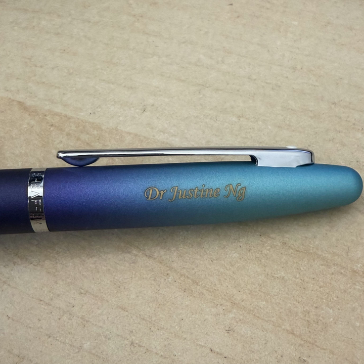 Custom Pen Engraving – Personalised Name Engraving on Sheaffer VFM 9430 Expressions Blue and Purple Pearlised Gradient Fountain Pen with Chrome-Plated Trims (WW31 Expressions) at Cityluxe WorkRoom