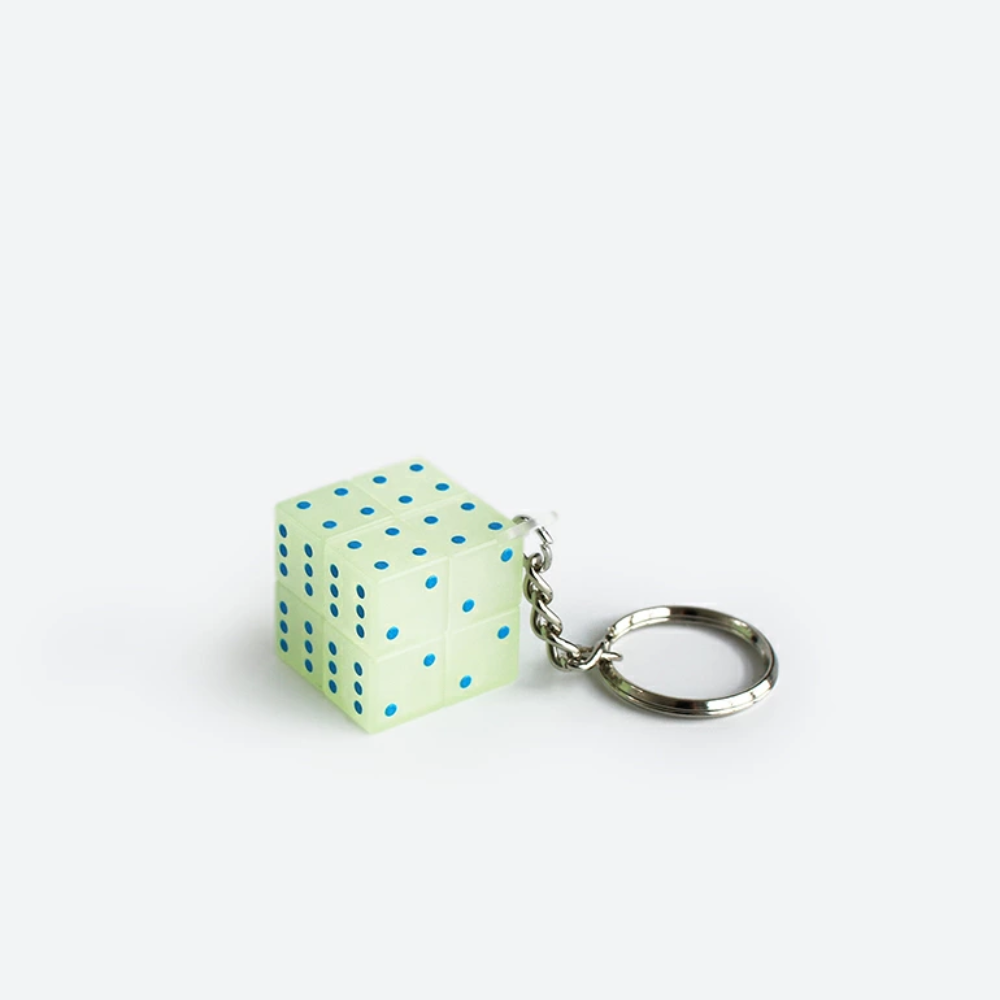 Hightide Magic Cube glow-in-the-dark 2×2 puzzle with dice-style pattern and attached keychain.