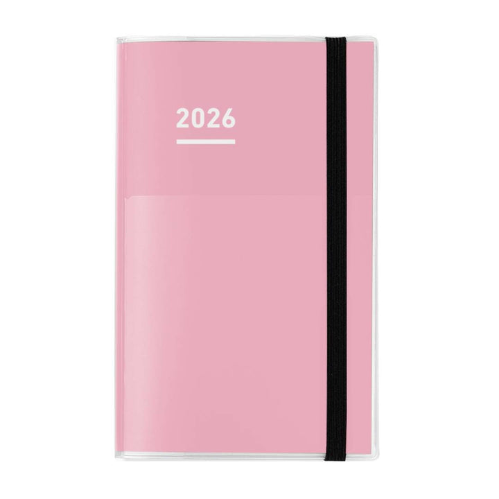 A sleek Kokuyo Jibun Techo First Kit in A5 Slim size with a pink matte cover and built-in pen holder. The set includes three booklets—DIARY for schedules, LIFE for personal milestones, and IDEA for notes—offering a complete system for planning, reflection, and creativity.