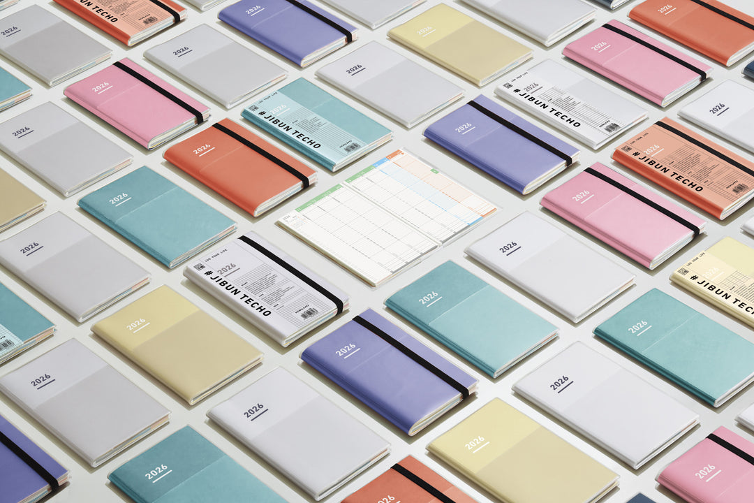 A Kokuyo Jibun Techo First Kit 2025 B6 Mini Slim, featuring a sleek matte PVC cover with a built-in pen holder. Includes DIARY, LIFE, and IDEA booklets for complete planning and self-discovery.